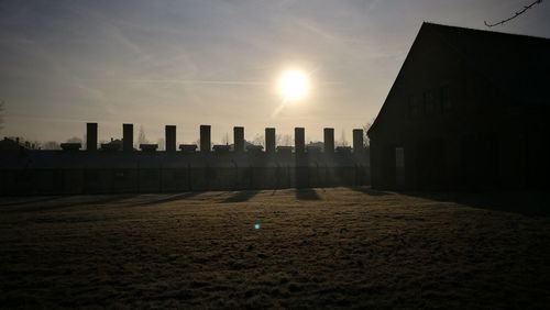 View of buildings against sky at sunset