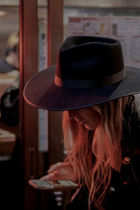 Portrait of woman wearing hat