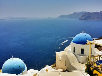 High angle view of sea against blue sky