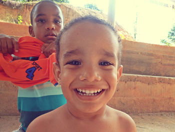 Portrait of smiling boy playing in the garden