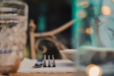 Close-up of old machine on table