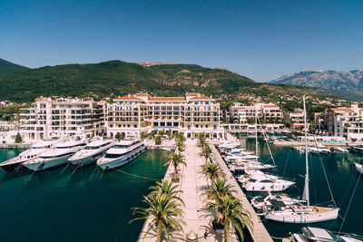 Boats moored at harbor