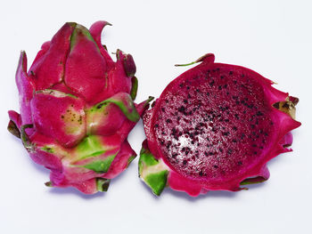 Close-up of strawberry over white background