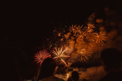 Firework display at night