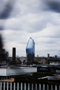 Modern buildings in city against sky