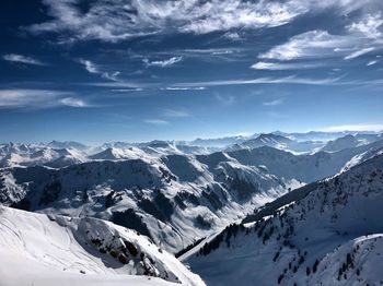 Scenic view of snowcapped mountains against sky