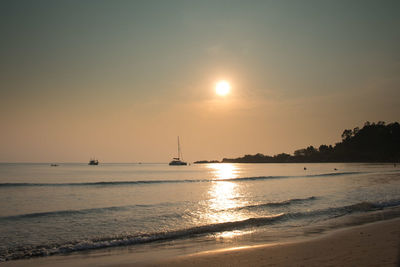 Scenic view of sea at sunset