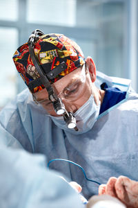 Close-up of man wearing hat