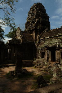 Ancient temple against building