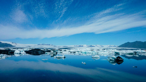 Scenic view of icelandic glacier lake against sky