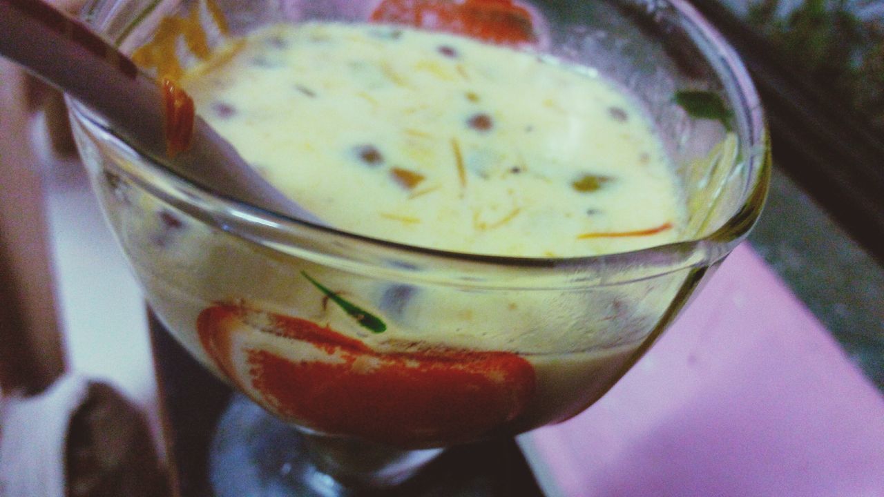 food and drink, drink, freshness, refreshment, close-up, indoors, drinking glass, still life, table, healthy eating, food, focus on foreground, glass - material, drinking straw, spoon, transparent, fruit, red, ice cube, cocktail