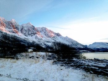 Scenic view of snowcapped mountains against sky