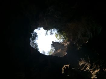 Low angle view of moon in sky at night