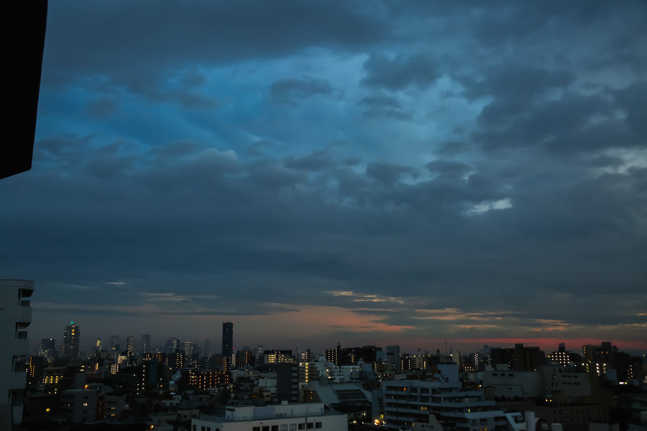 CITYSCAPE AGAINST SKY DURING SUNSET