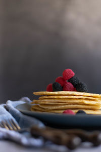 Homemade crepes on table, dark food photography, space for text