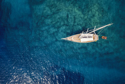 High angle view of sailboat sailing in sea