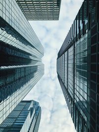 Low angle view of modern buildings against sky