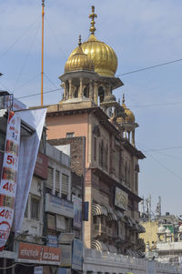 Low angle view of buildings against sky