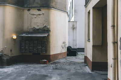 An abandoned house with back yard in color