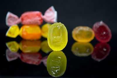 Close-up of fruits against black background