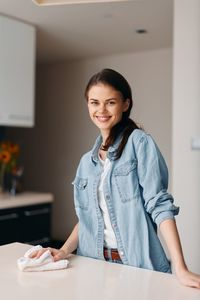 Portrait of young businesswoman working at office