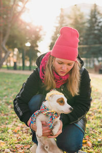 Portrait of woman with dog