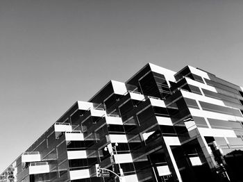 Low angle view of modern buildings against clear sky