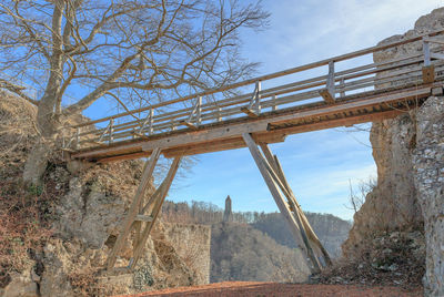 Low angle view of old bridge against sky