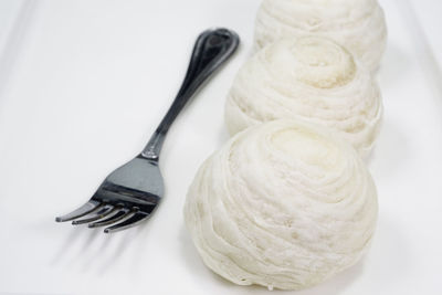 High angle view of ice cream against white background