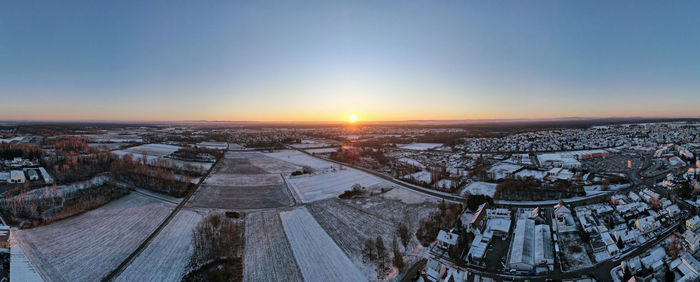 High angle view of buildings against sky during winter