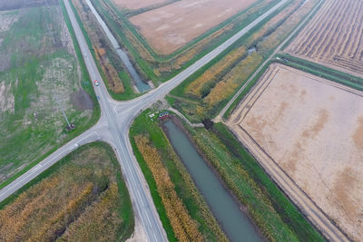 High angle view of road amidst field