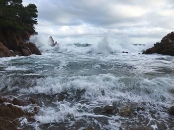 View of beach with turbulent wave 