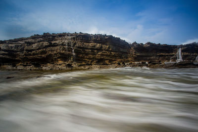 Beautiful long exposure scenery of tanjung layar beach, sawarna, indonesia - may 2016