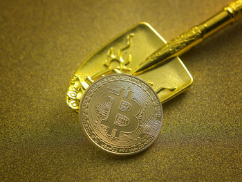 Close-up of coin on table