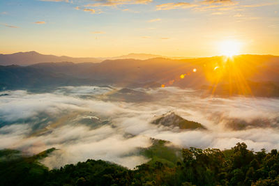 Scenic view of mountains against sky during sunset