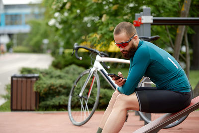 Side view of man exercising in gym