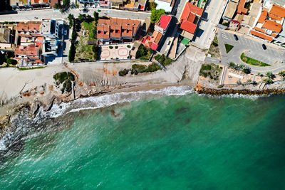 High angle view of buildings in sea