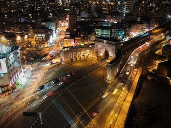 High angle view of light trails on road at night