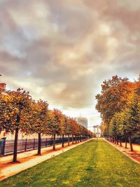 Autumn trees in park against sky