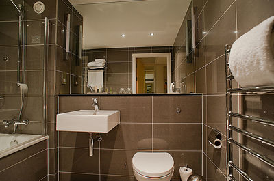 Interior of illuminated bathroom