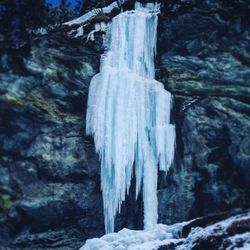 Close-up of icicles on rock