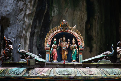 Statue of buddha outside building