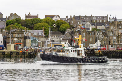 Tugboat on the way in lerwick harbor