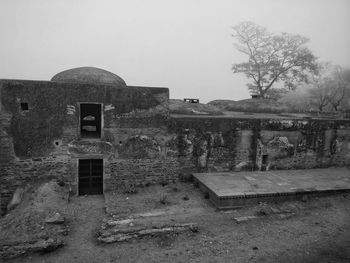 Abandoned building against sky