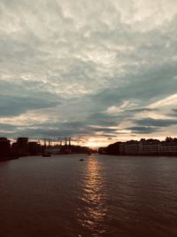 Scenic view of sea and buildings against sky