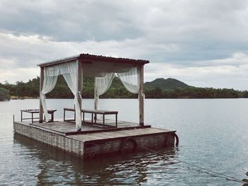 Built structure on beach against sky