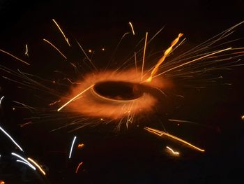 Close-up of illuminated firework display at night