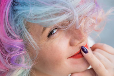 Close-up of young woman with make-up