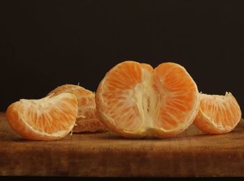 Close-up of orange slices on table