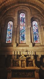 Low angle view of statues on window